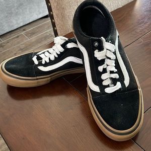 Vans men’s shoe size 7.5 Black and white with brown soles